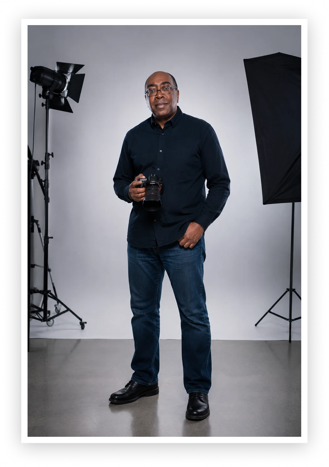 Marvin Hall in his Lansing studio, camera in hand